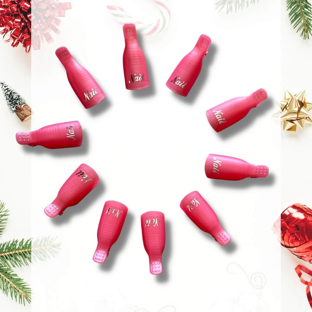 Cutie Pop Nail Shop nail polish remover clips holding nail strips for easy removal and application.