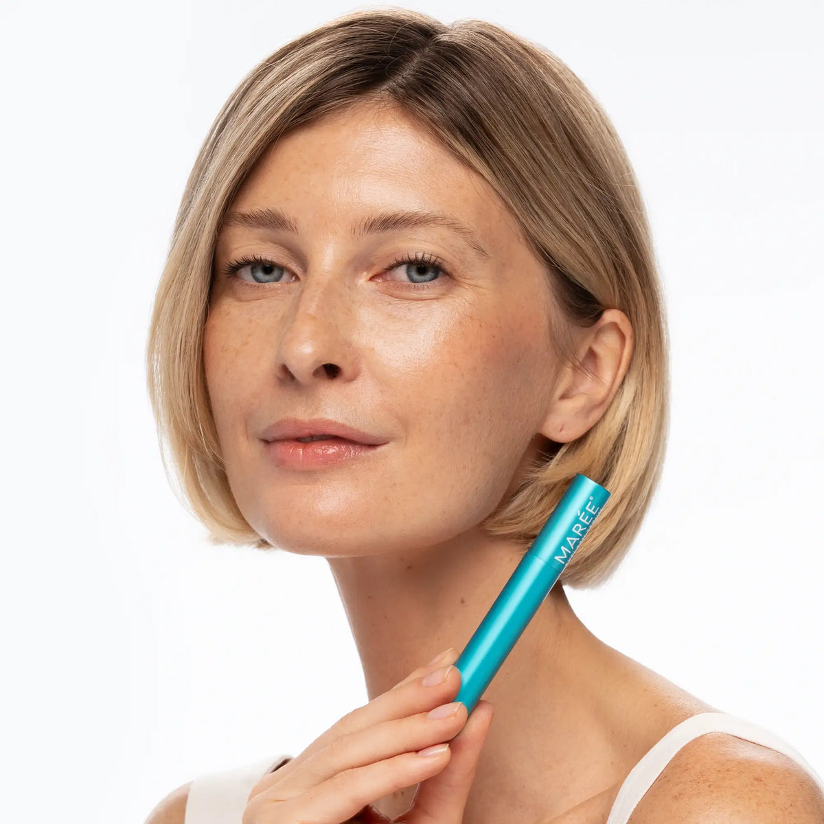 Maree Lash & Brow Growth Serum bottle with applicator wand for fuller-looking eyelashes and eyebrows.