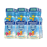 Vanilla PediaSure nutritional shake in a 6-pack of 8 oz bottles, featuring Farmacias Savia branding and clear product label.