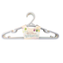 Set of five clear plastic hangers with notches for clothing, ideal for closet organization, by Farmacias Savia.