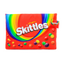 Red rectangular pillow featuring Skittles design, ideal for pet beds, from Farmacias Savia. Soft and colorful pet accessory.