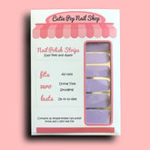 Periwinkle Cutie Pop Nail Shop nail strips displayed on a white background, showcasing vibrant, colorful nail art designs.