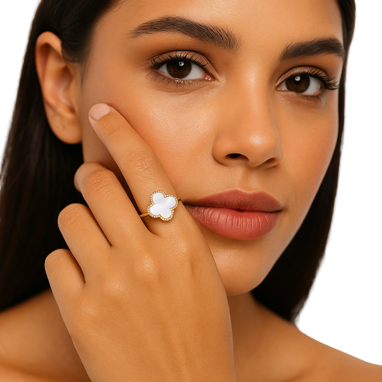 Elena White Clover Ring in jewelry, featuring a delicate white clover design, showcasing elegant craftsmanship and fine detailing.