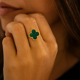 Gold Camila Clover Ring with Malachite gemstone, showcasing elegant jewelry design in this detailed image.