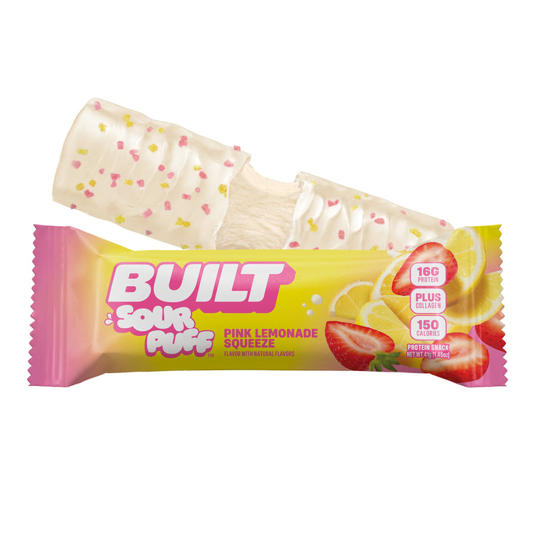 Pink Lemonade Squeeze sour puff from BUILT, stacked with pink and yellow colors, showing a chewy, fluffy snack with vibrant packaging.