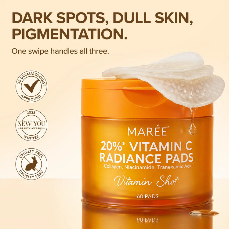 Maree Dark Spot Fading Vitamin C Pads with brightening serum and cotton pads for skincare in a clear container.