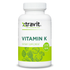 Xtravit Vitamin K capsules in a bottle, dietary supplement, 30-count, with label showing product name and branding.