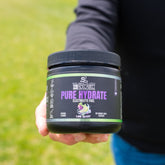 BlackLabel Supplements PURE HYDRATE beverage powder in strawberry kiwi flavor, showing the product container and colorful packaging.