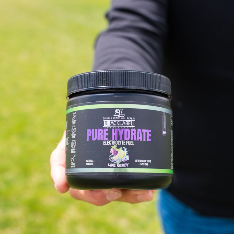 BlackLabel Supplements PURE HYDRATE beverage powder in strawberry kiwi flavor, showing the product container and colorful packaging.