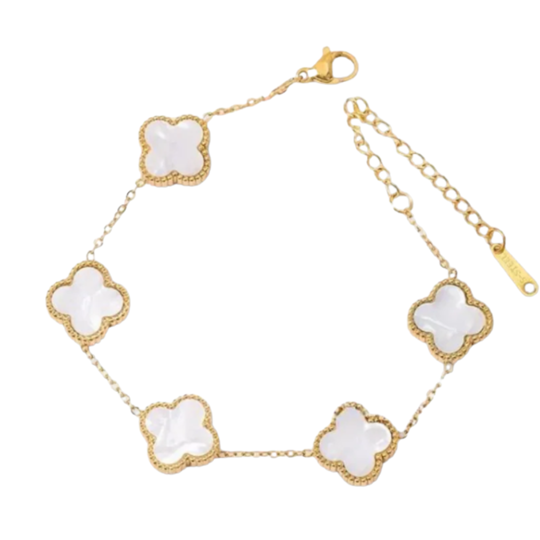 White mother of pearl Camila Clover bracelet with gold finish, elegant jewelry piece showcasing delicate floral design.