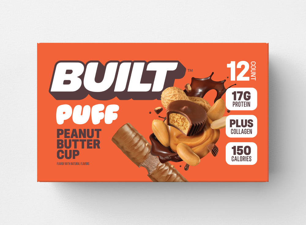 BUILT Peanut Butter Cup Puff, a snack puffs treat with creamy peanut butter flavor and chocolate coating, displayed in a close-up image.