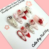 Almond-shaped nail with Rose Veil Lace design from Cutie Pop Nail Shop, showcasing intricate lace pattern on manicured nails.