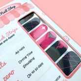 Black and pink nail strips from Cutie Pop Nail Shop, showcasing stylish nail art design for easy at-home manicures.