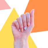 Cutie Pop Nail Shop Citrus Punch nail strips with bright citrus fruit design for a fun, vibrant manicure.