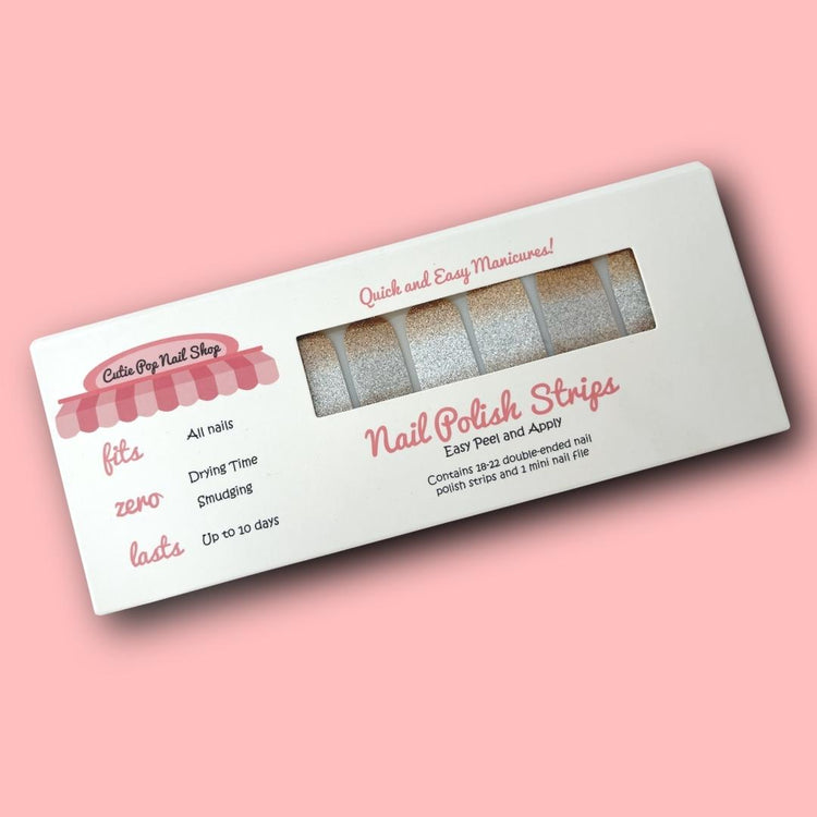 Gold and silver ombre nail strips from Cutie Pop Nail Shop featuring a stylish gradient design for trendy manicures.