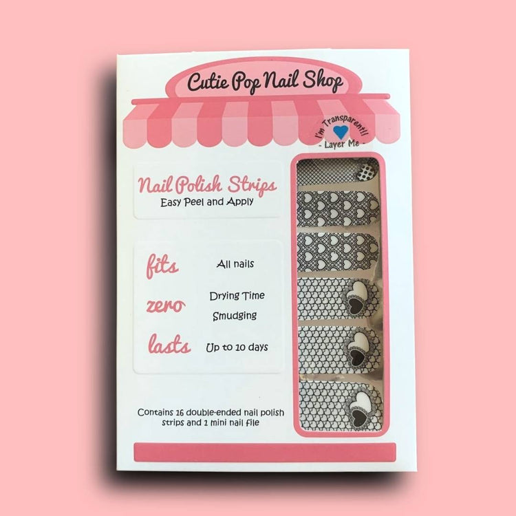 Transparent nail strips with heart designs from Cutie Pop Nail Shop, showcasing stylish and easy-to-apply nail art.