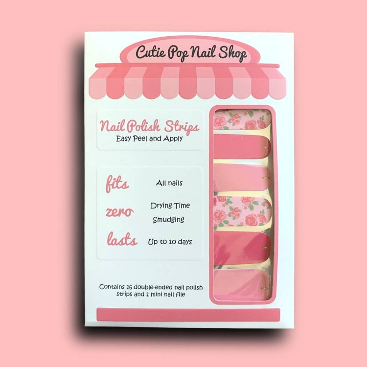 MidSummer Rose nail strips by Cutie Pop Nail Shop with floral pink and rose designs on a neutral background.