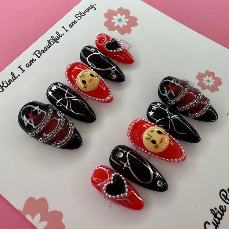 Medium almond-shaped Stray Kids concert press-on nails by Cutie Pop Nail Shop, featuring a stylish, vibrant design.