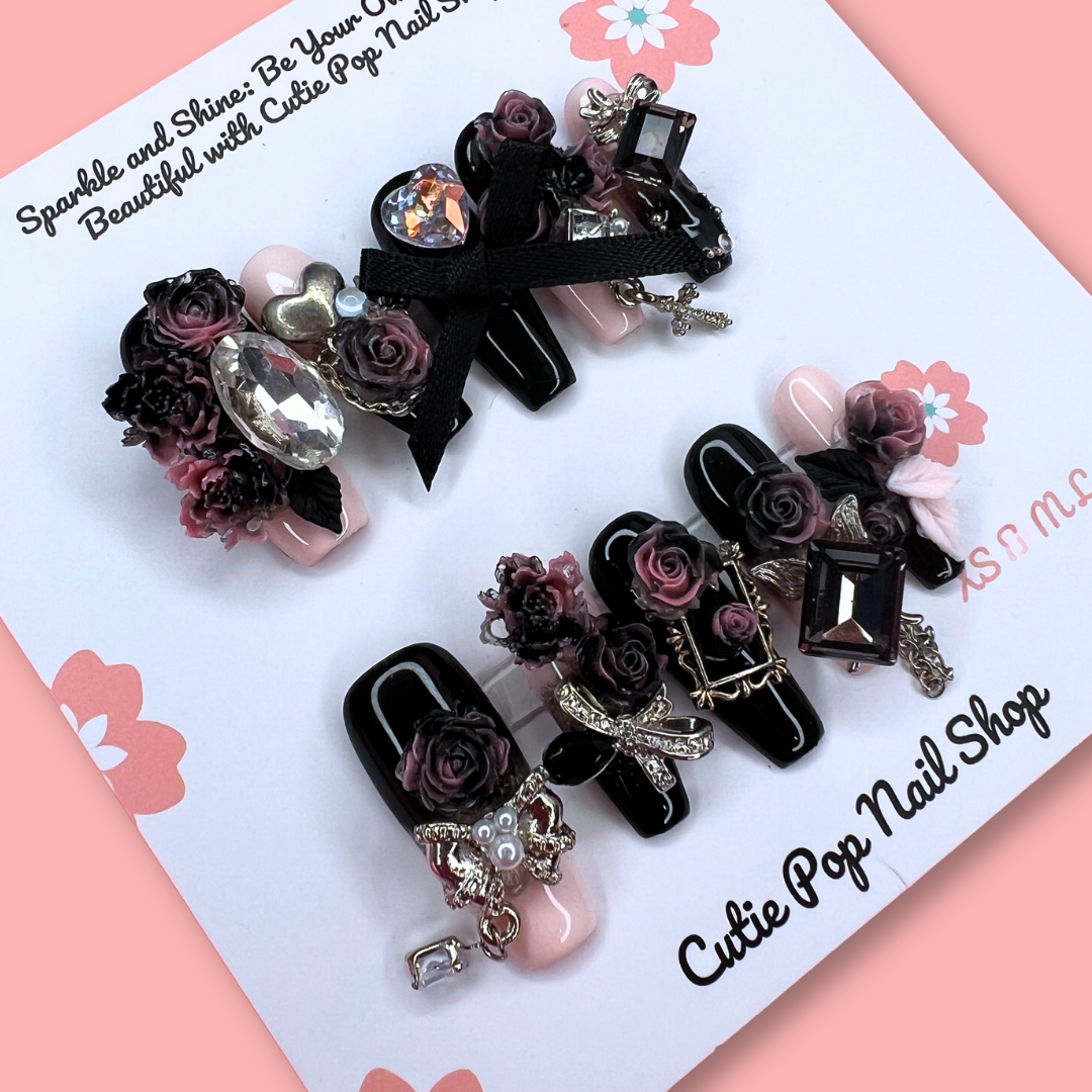 Blackpink-inspired Gothic Rose press-on nails by Cutie Pop Nail Shop, long coffin shape with dark floral design and gothic accents.