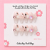 Short pink press-on nails with an elegant rose design from Cutie Pop Nail Shop, featuring a coffin shape and glossy finish.