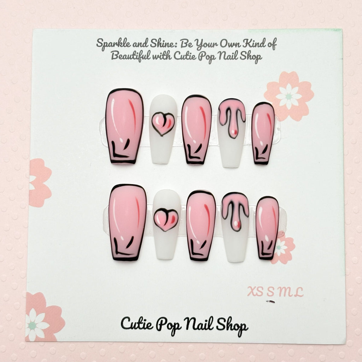 Cartoon Drip press-on nails from Cutie Pop Nail Shop featuring colorful drip design and trendy nail art.