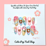 Press on nails featuring a cute Dango Bear design from Cutie Pop Nail Shop, with adorable bear illustrations on nail tips.
