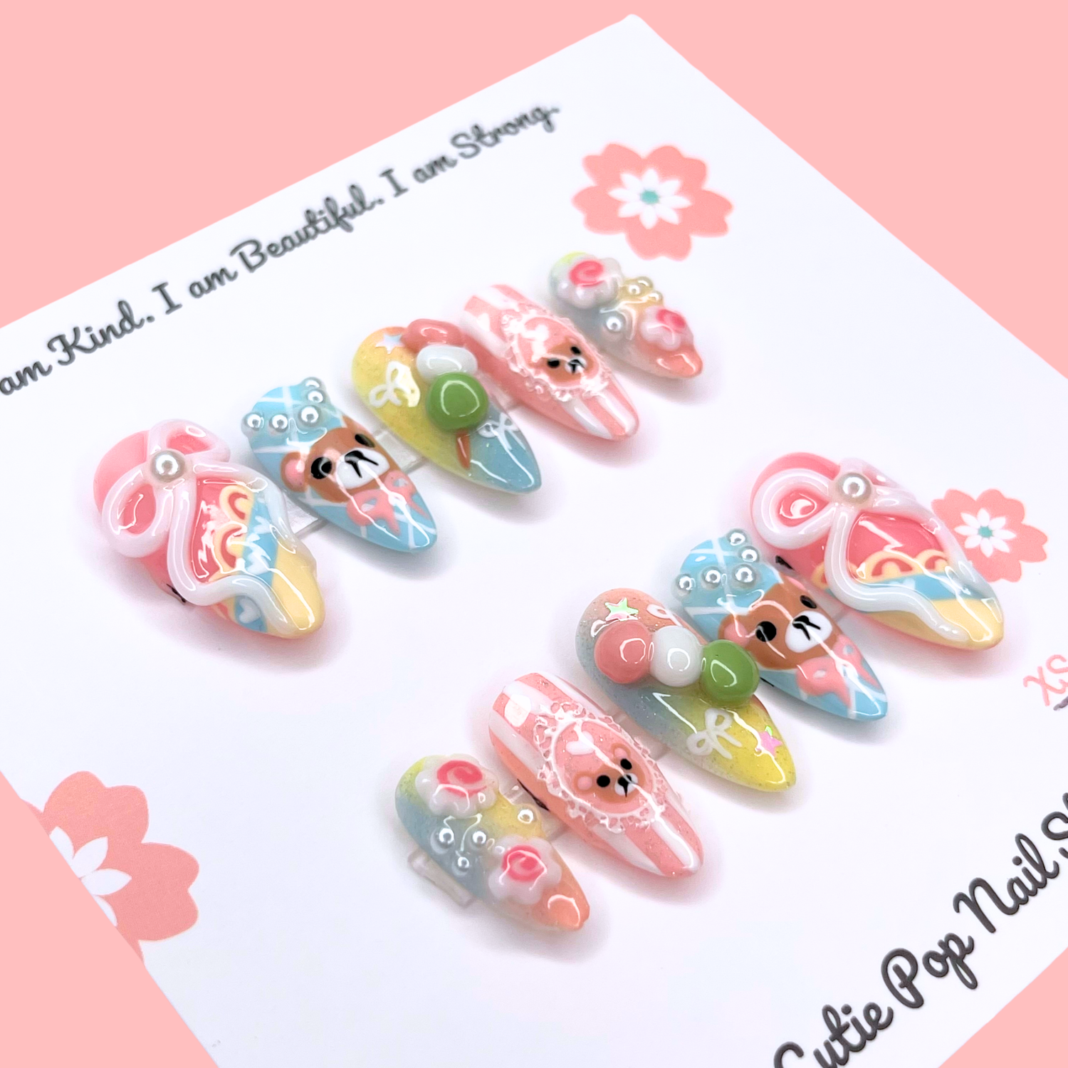 Cutie Pop Nail Shop Dango Bear press-on nails featuring cute bear design on short, natural-looking nail tips.