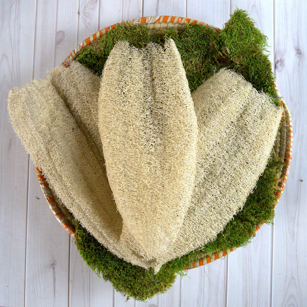 Ugandan Exfoliator Natural Loofah by Duma Mbili LLC, an African exfoliating scrubber for gentle skin exfoliation.