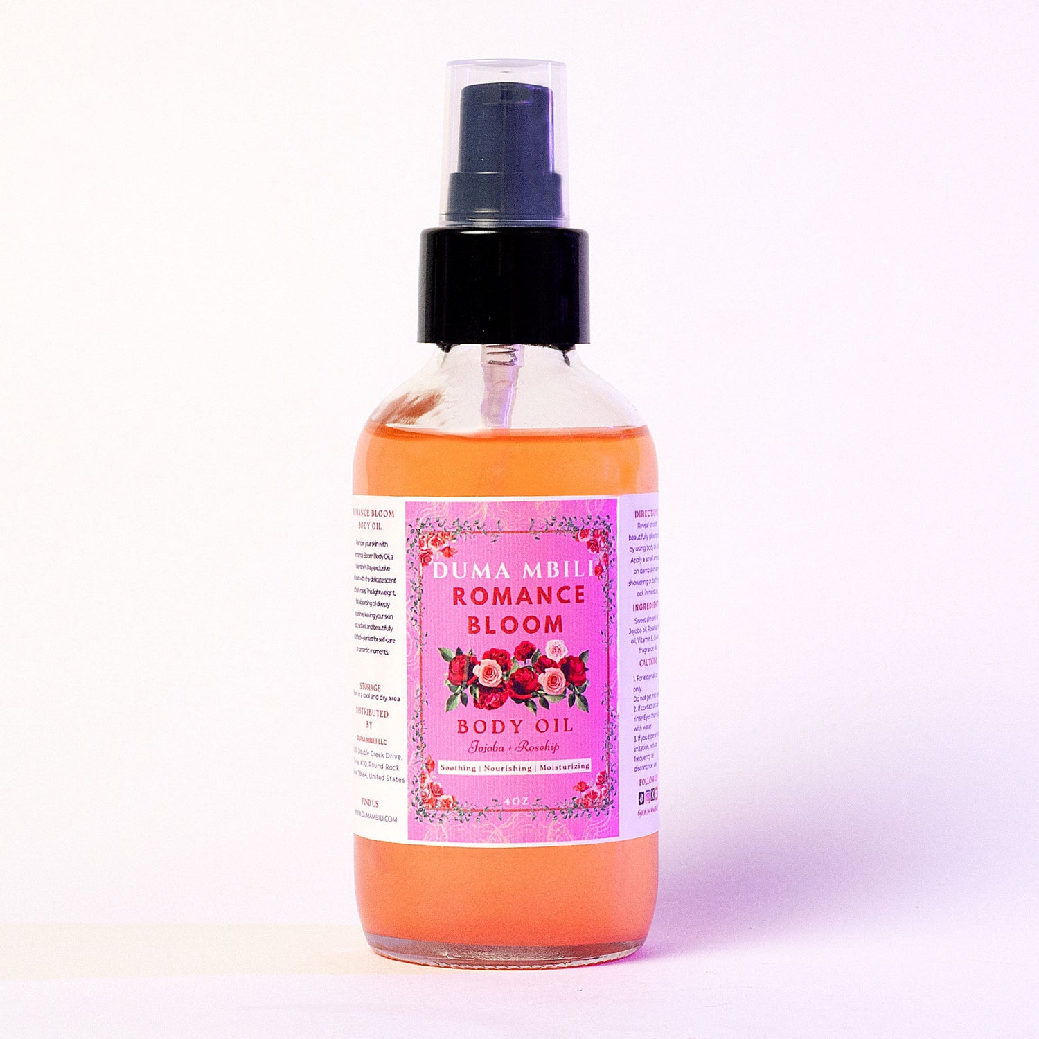 Duma Mbili LLC Romance Bloom African Musk Body Oil in 4 oz bottle, with floral and musk scent visible in elegant packaging.