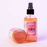 African Musk Body Oil by Duma Mbili LLC in Romance Bloom scent, 4 oz bottle with a luxurious, silky oil texture.