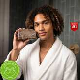 Authentic African Black Soap by Duma Mbili LLC in a 4 oz bar, traditional organic skincare for clear, glowing skin.