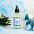 Blue Christmas Body Oil by Duma Mbili LLC, 4 oz, featuring a vibrant blue color and festive holiday-themed packaging.