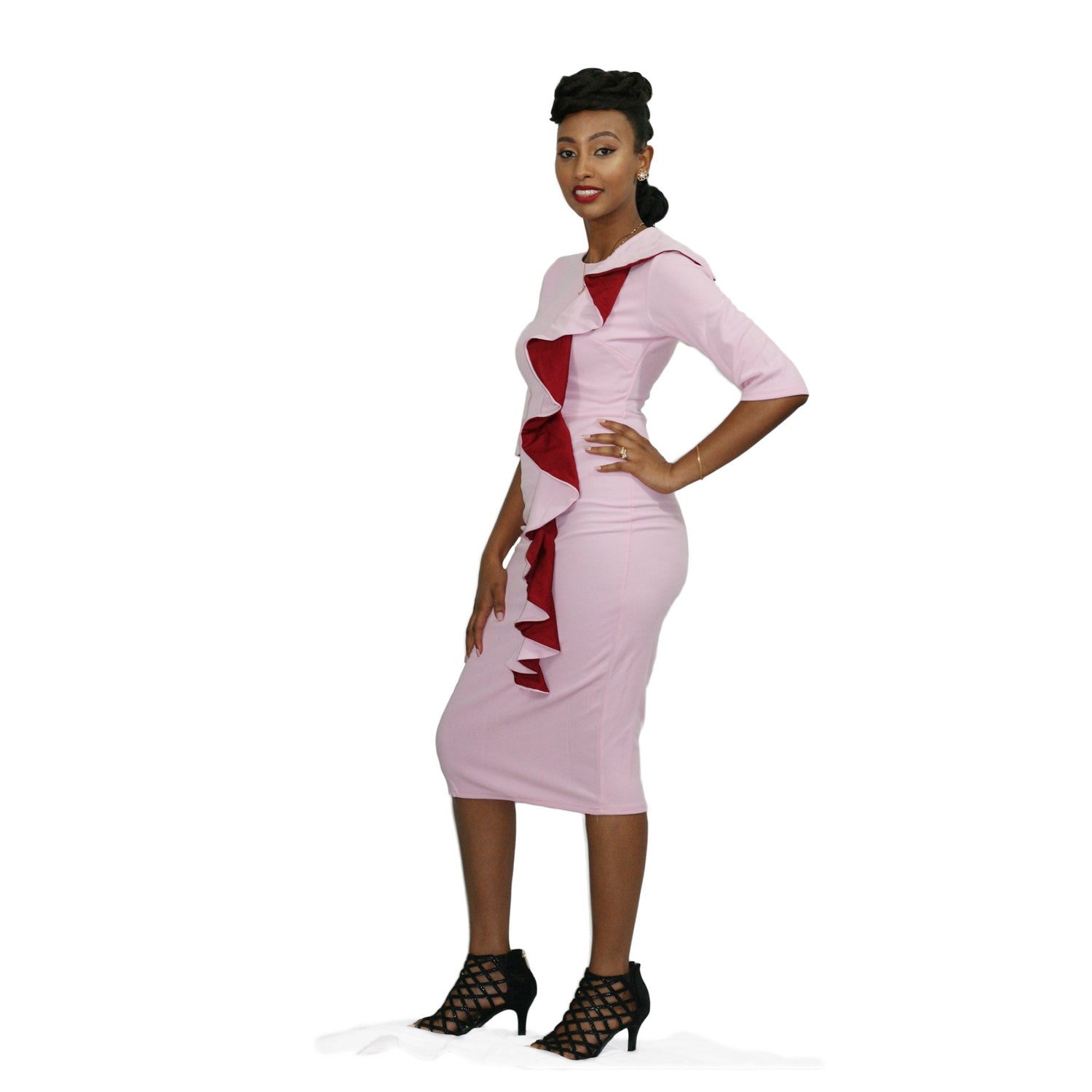 Duma Mbili LLC casual dashiki pencil dress featuring vibrant, colorful fabric and a fitted silhouette for stylish everyday wear.