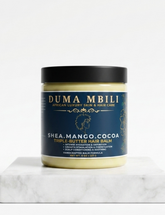 Duma Mbili Shea Mango Cocoa Triple-Butter Hair Balm jar with natural shea, mango, and cocoa ingredients for hair nourishment