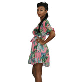 Floral V-neck summer mini dress by Duma Mbili LLC featuring a vibrant floral pattern and lightweight fabric.