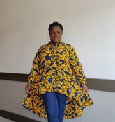 Blue and yellow Kente African print high-low button-up blouse by Duma Mbili LLC, featuring vibrant traditional fabric and stylish design.