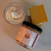 Duma Mbili LLC S’mores whipped body butter in a 4oz jar, creamy, fluffy texture with chocolate and marshmallow scent details visible