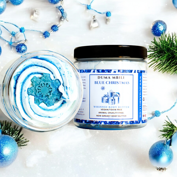 Blue Christmas whipped body butter by Duma Mbili LLC in an 8 oz container, showcasing a festive blue-hued creamy body moisturizer.