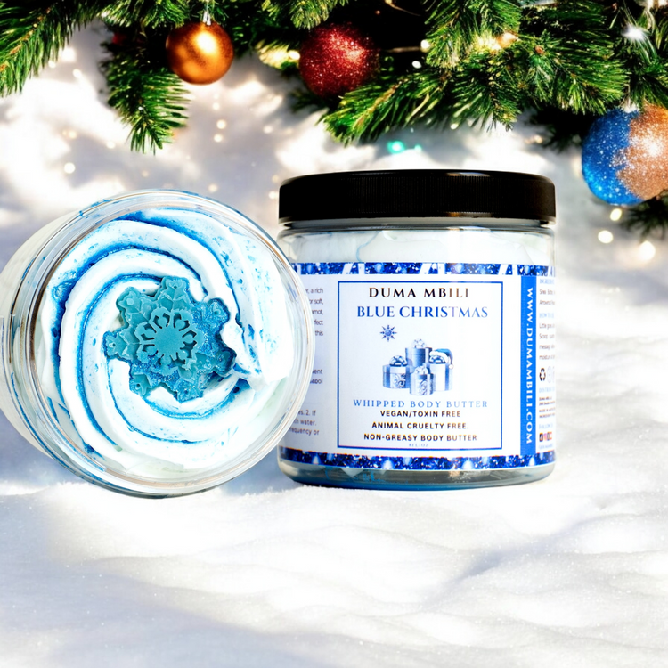 Blue Christmas whipped body butter by Duma Mbili LLC in an 8 oz jar, showing the creamy, festive-scented body moisturizer.