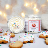 Duma Mbili LLC Sugar Cookie Sprinkles whipped body butter in a jar, showcasing its creamy texture and colorful sprinkle decoration.