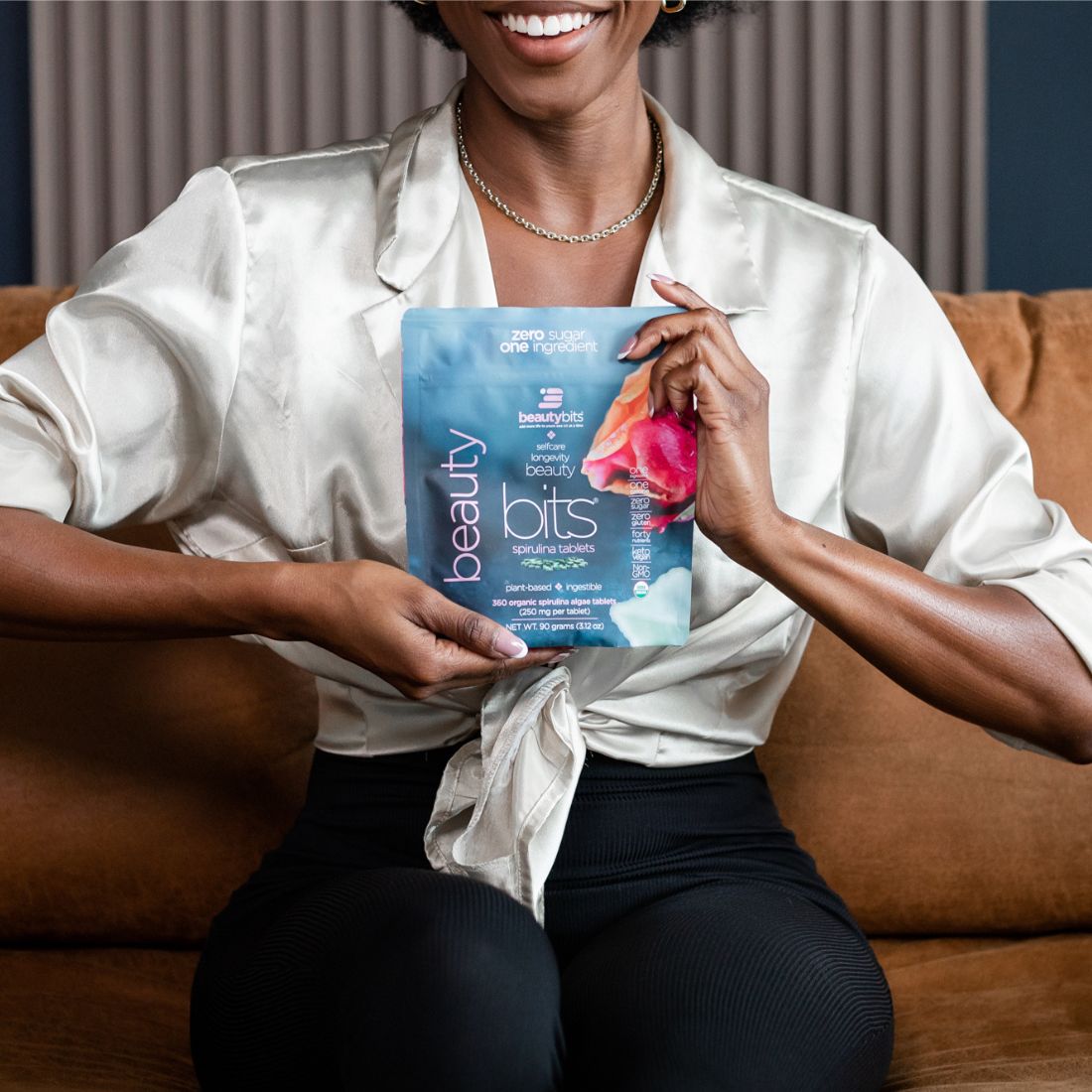 Large bag of ENERGYbits BEAUTYbits® Spirulina supplement, shown in a subscription packaging, highlighting the product&