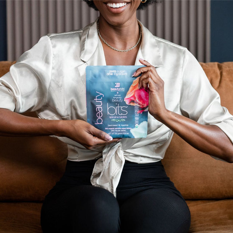 Large bag of ENERGYbits BEAUTYbits® Spirulina supplement, shown in a subscription packaging, highlighting the product&