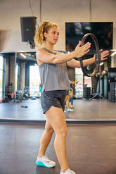 Dark grey Goal Five boxy crop tank top for women, featuring a relaxed fit and sleeveless design.
