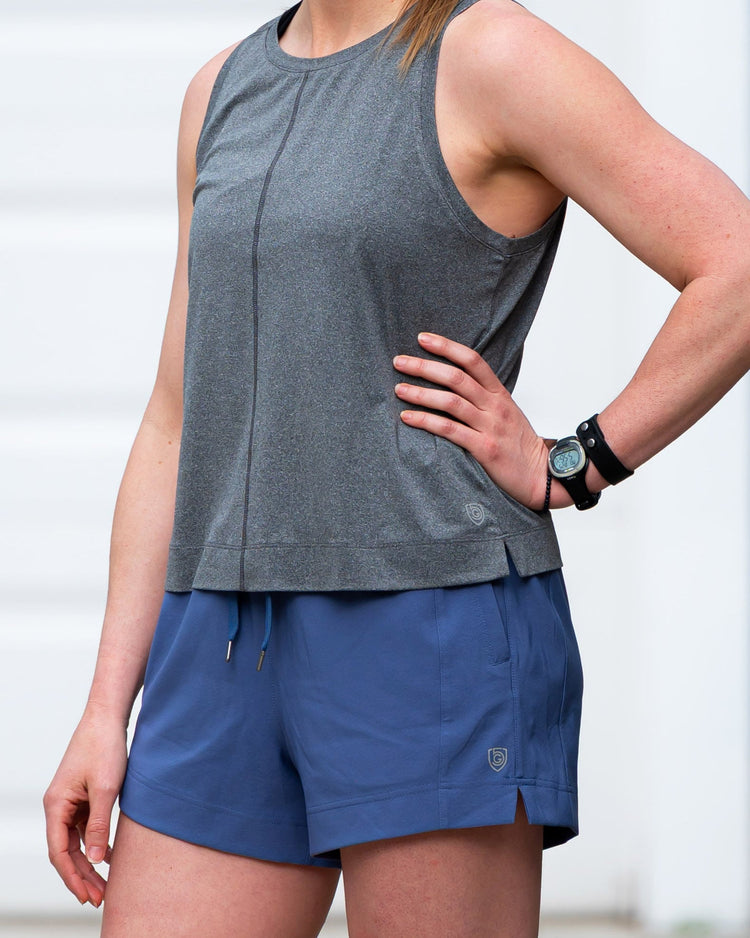 Dark grey Goal Five boxy crop tank top with wide straps and relaxed fit, displayed on a plain background.