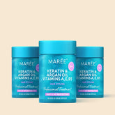 Maree Keratin Oil Capsules for frizz control, showing soft, shiny hair with the capsules in the foreground.