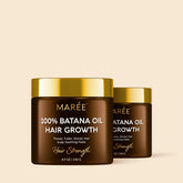 Maree Pure Batana Hair Growth Paste in a jar, showcasing the natural herbal hair treatment product with a smooth texture.