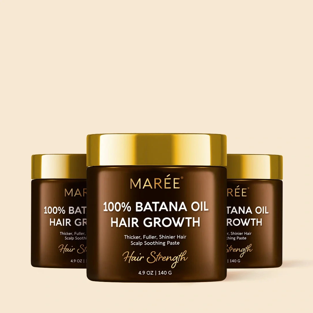 Natural batana hair growth paste by Maree, showing the creamy herbal product in a jar with a smooth texture.