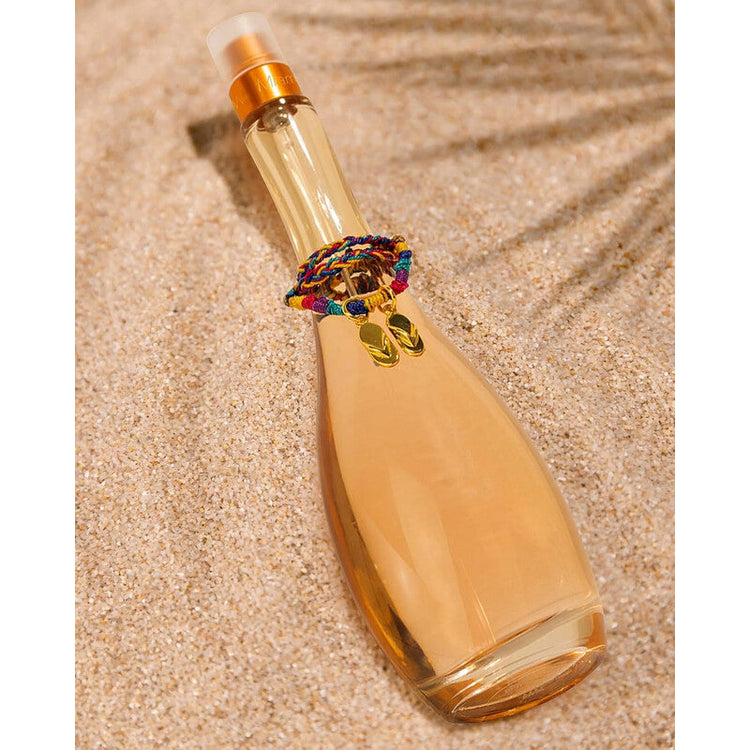Jennifer Lopez Miami Glow Eau de Toilette perfume spray for women, 3.4 oz, in a sleek bottle with a vibrant pink and gold design.