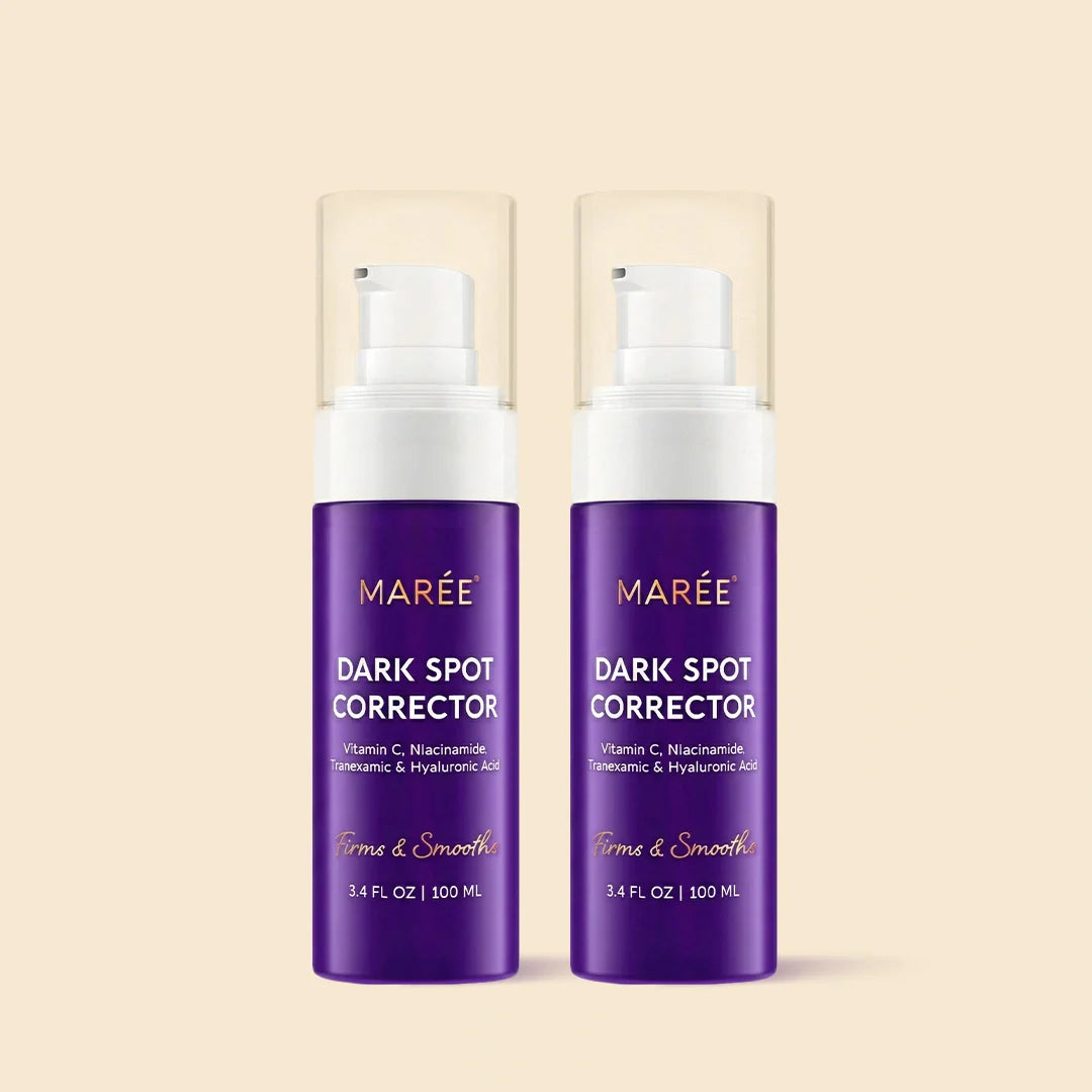 Maree Face and Body Serum for Dark Spots shown in a clear bottle with dropper, designed to reduce dark spots on skin.