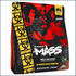 Mutant Mass 5lbs weight gainer powder in a container, designed for muscle building and high-calorie nutrition.